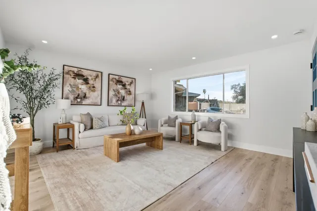 a living room with furniture and a couch