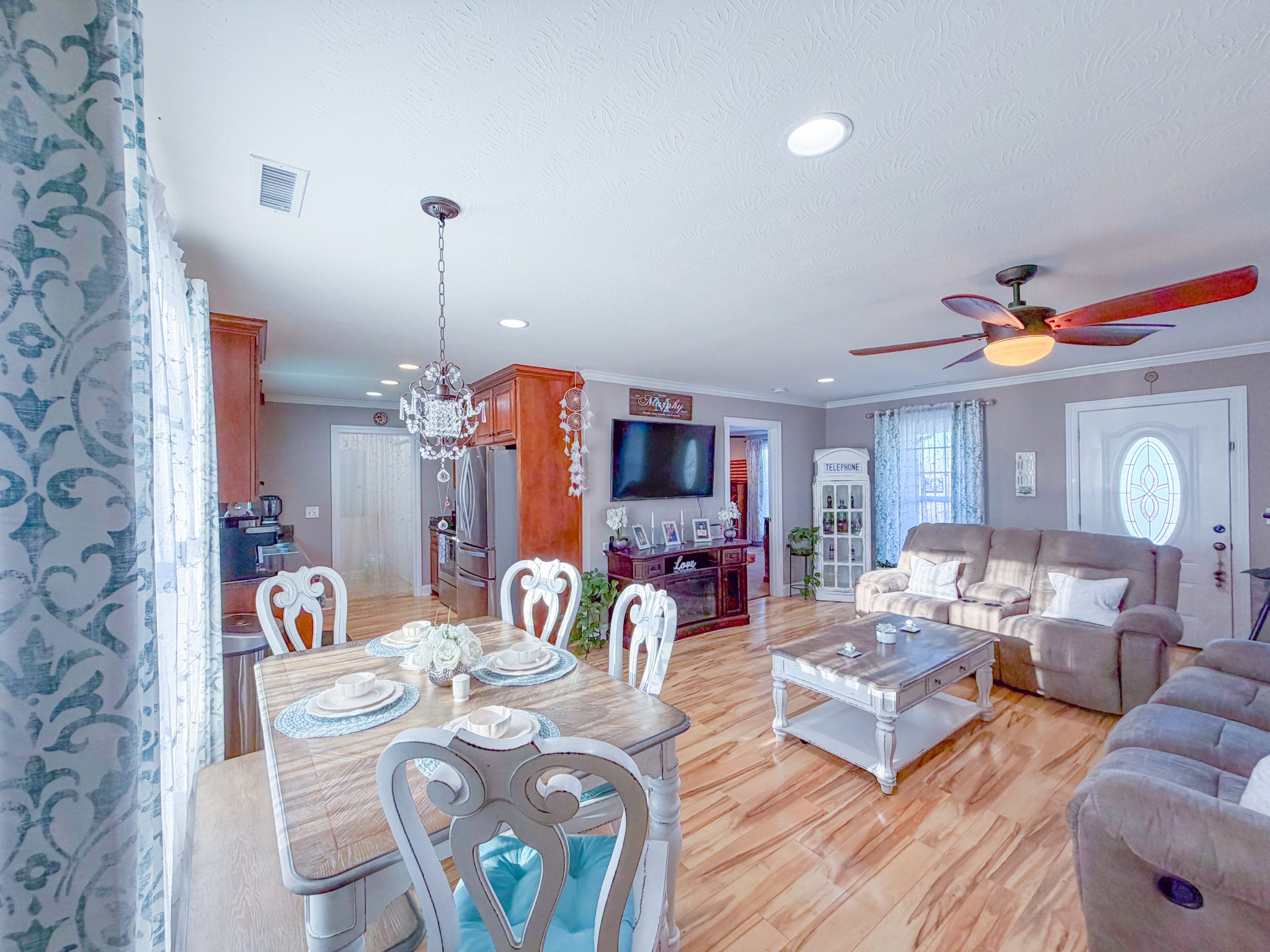 190 Johnson Road Pulaski, TN 38478 - Photo 19 of 41 a living room with furniture and a chandelier