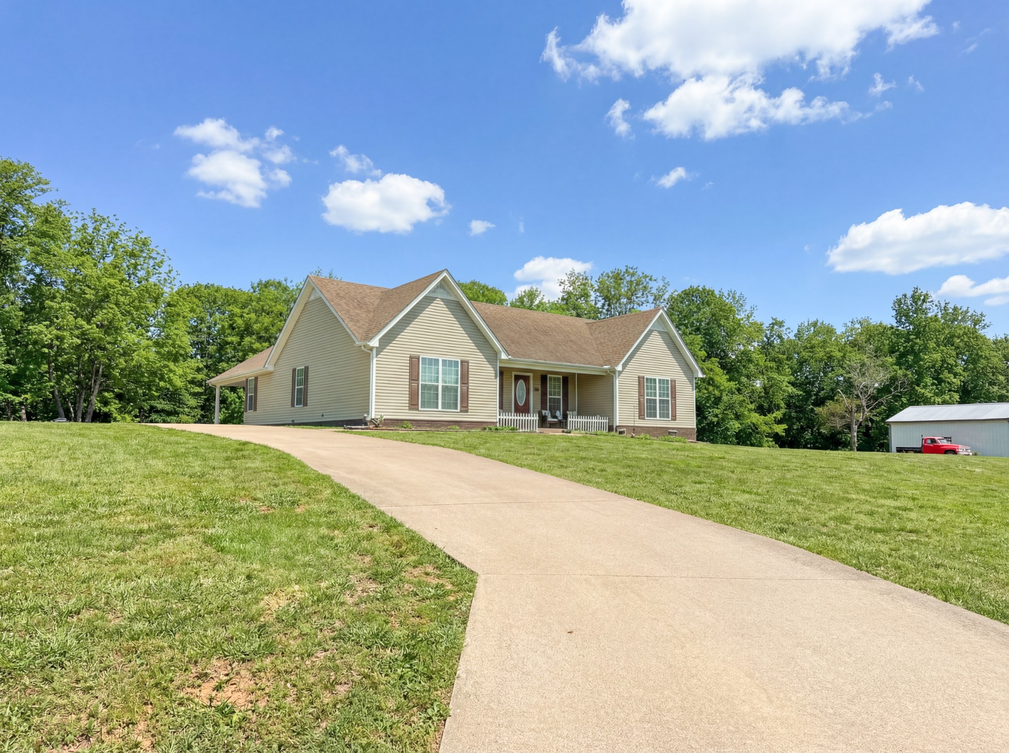 190 Johnson Road Pulaski, TN 38478 - Photo 2 of 41 a view of a house with a yard and chandelier