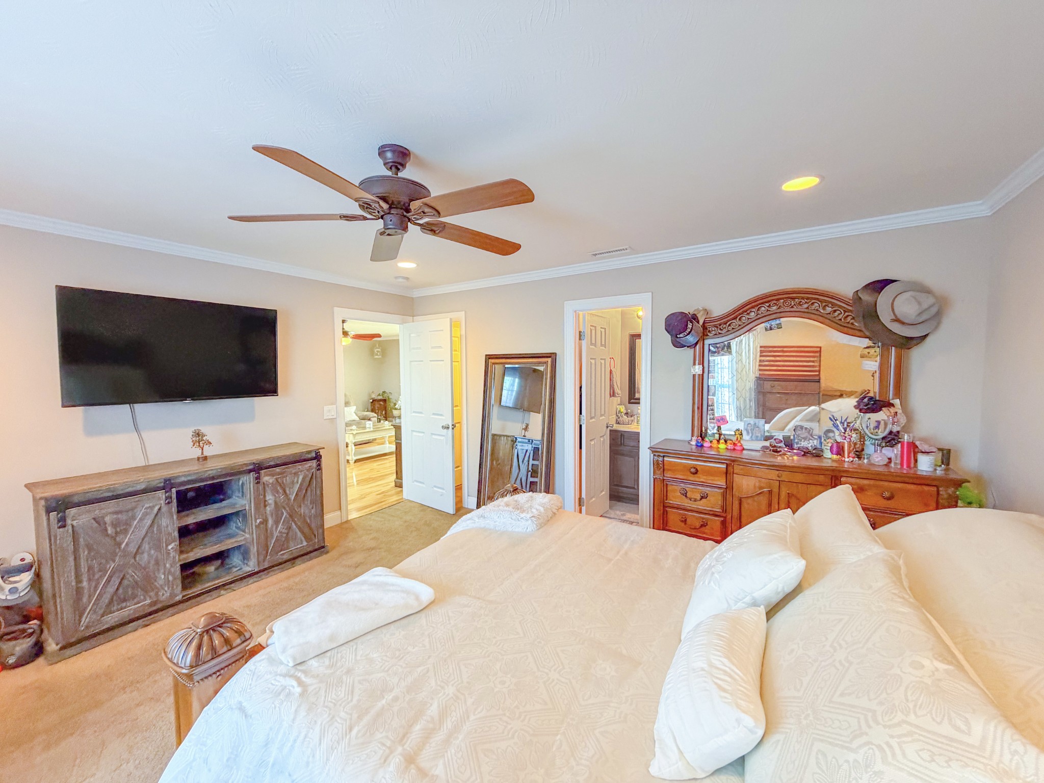 190 Johnson Road Pulaski, TN 38478 - Photo 26 of 41 a bedroom with a bed and a flat screen tv