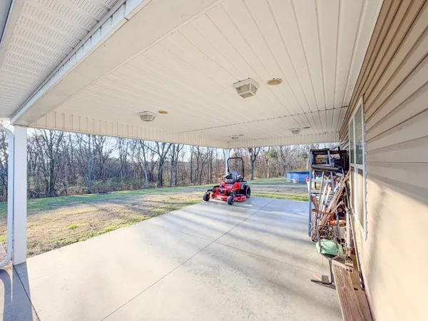 a view of a garage with parked cars