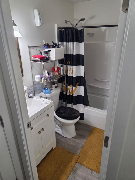 800 County Street, Unit 320 Taunton, MA 02780 - Photo 5 of 10 a bathroom with a sink a toilet and shower