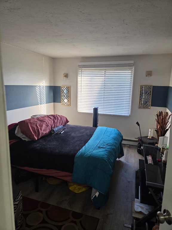 800 County Street, Unit 320 Taunton, MA 02780 - Photo 9 of 10 a bedroom with a bed and window