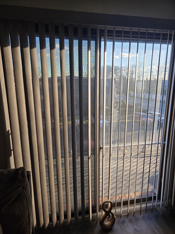 800 County Street, Unit 320 Taunton, MA 02780 - Photo 10 of 10 a view of a porch with wooden floor