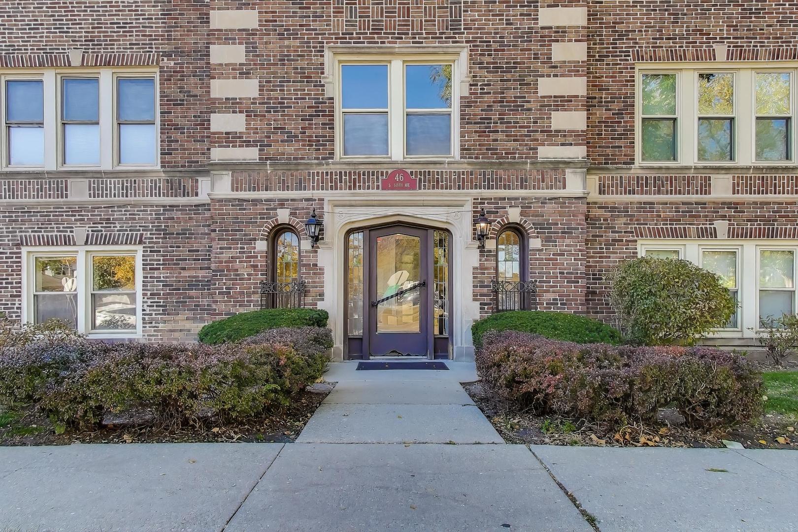 46 6th Avenue, Unit GJ La Grange, IL 60525 - Photo 2 of 15 front view of a brick house with a yard