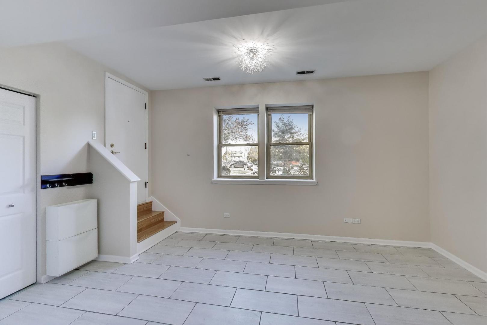 46 6th Avenue, Unit GJ La Grange, IL 60525 - Photo 5 of 15 a view of an entryway with workspace
