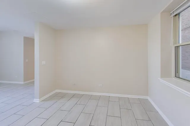 an empty room with windows