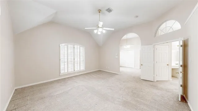 a large white room with a large window