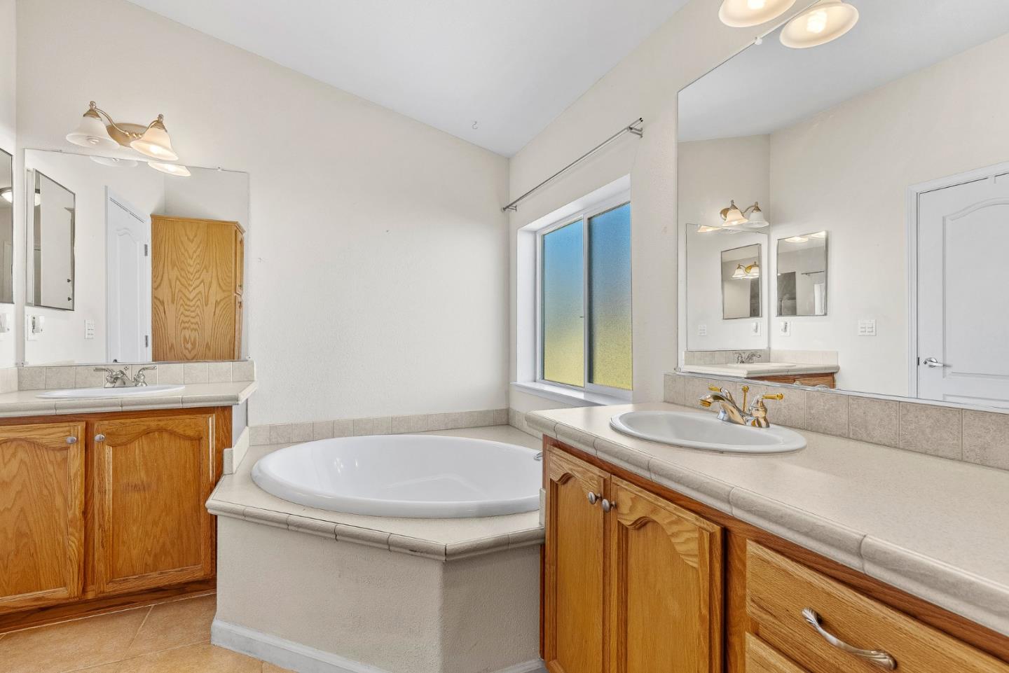 4160 Jade Street, Unit 72 Capitola, CA 95010 - Photo 11 of 23 a bathroom with a sink and a mirror