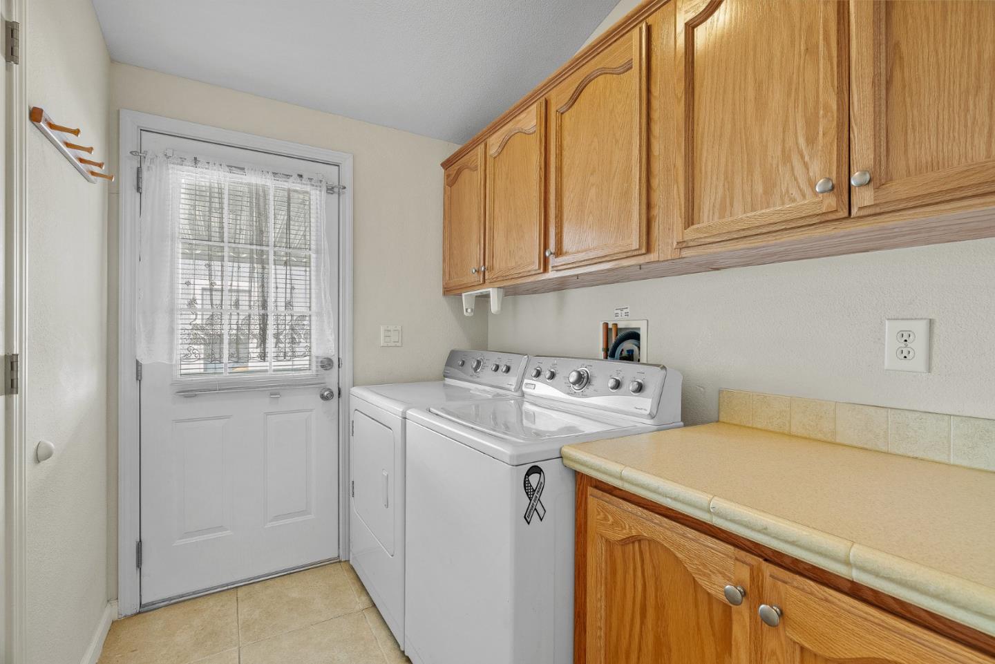 4160 Jade Street, Unit 72 Capitola, CA 95010 - Photo 16 of 23 a utility room with dryer and washer
