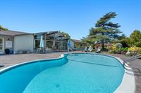 4160 Jade Street, Unit 72 Capitola, CA 95010 - Photo 18 of 23 a view of a house with a swimming pool