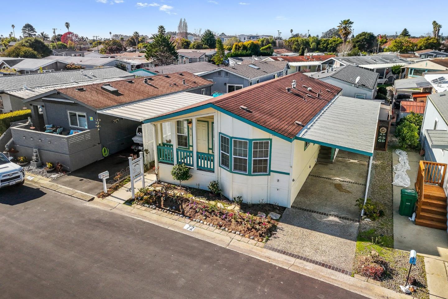 4160 Jade Street, Unit 72 Capitola, CA 95010 - Photo 21 of 23 an aerial view of a house with a garden and plants