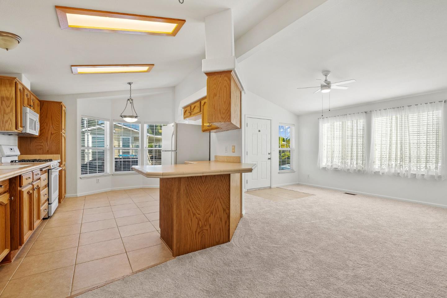 4160 Jade Street, Unit 72 Capitola, CA 95010 - Photo 5 of 23 a view of a kitchen with a sink and a window