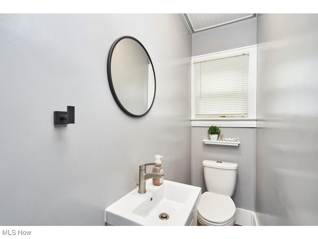 3468 Copley Road Akron, OH 44321 - Photo 10 of 22 Bathroom with sink and toilet