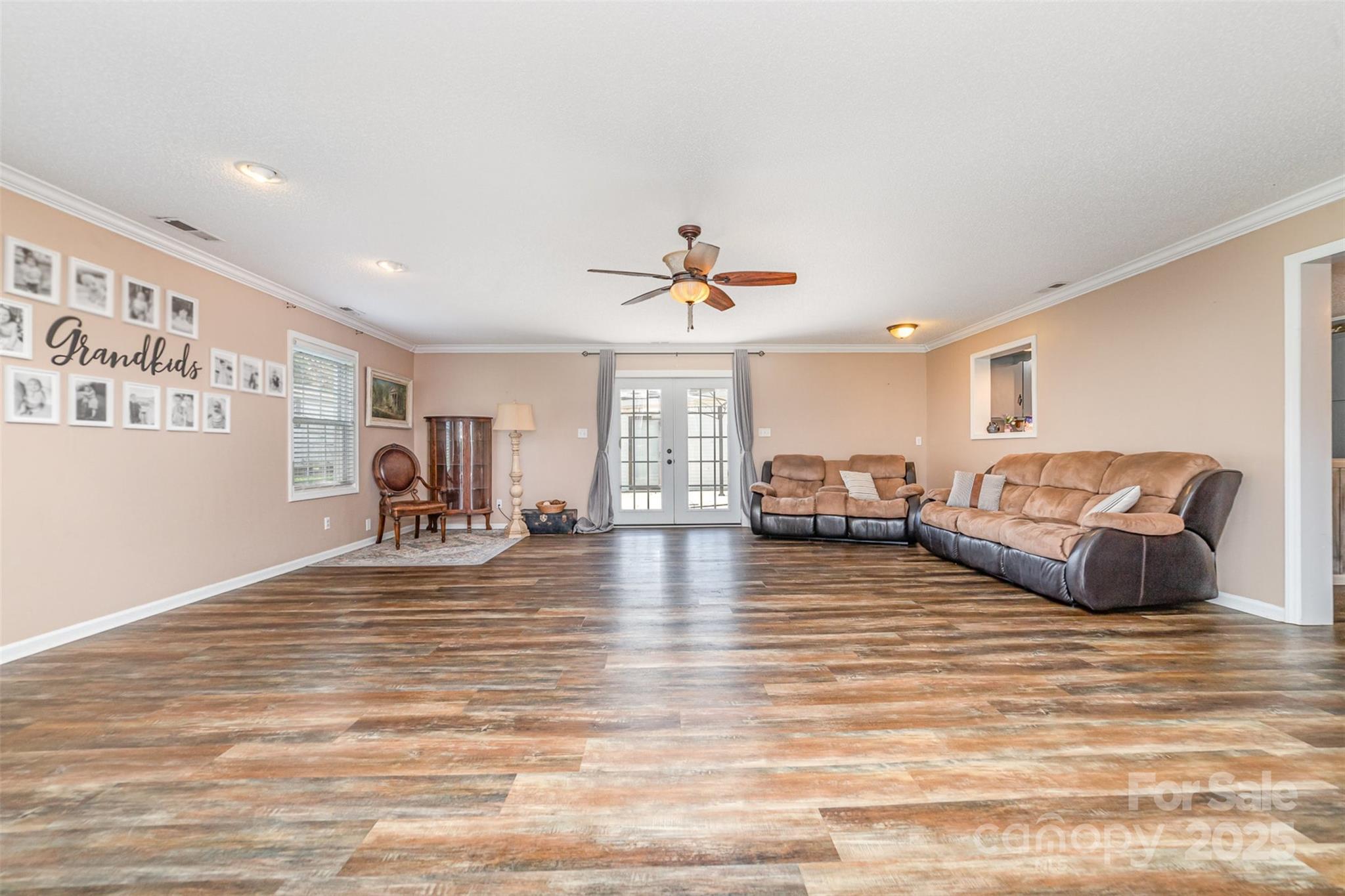 7430 Forney Hill Road Denver, NC 28037 - Photo 15 of 29 a living room with furniture and a large window