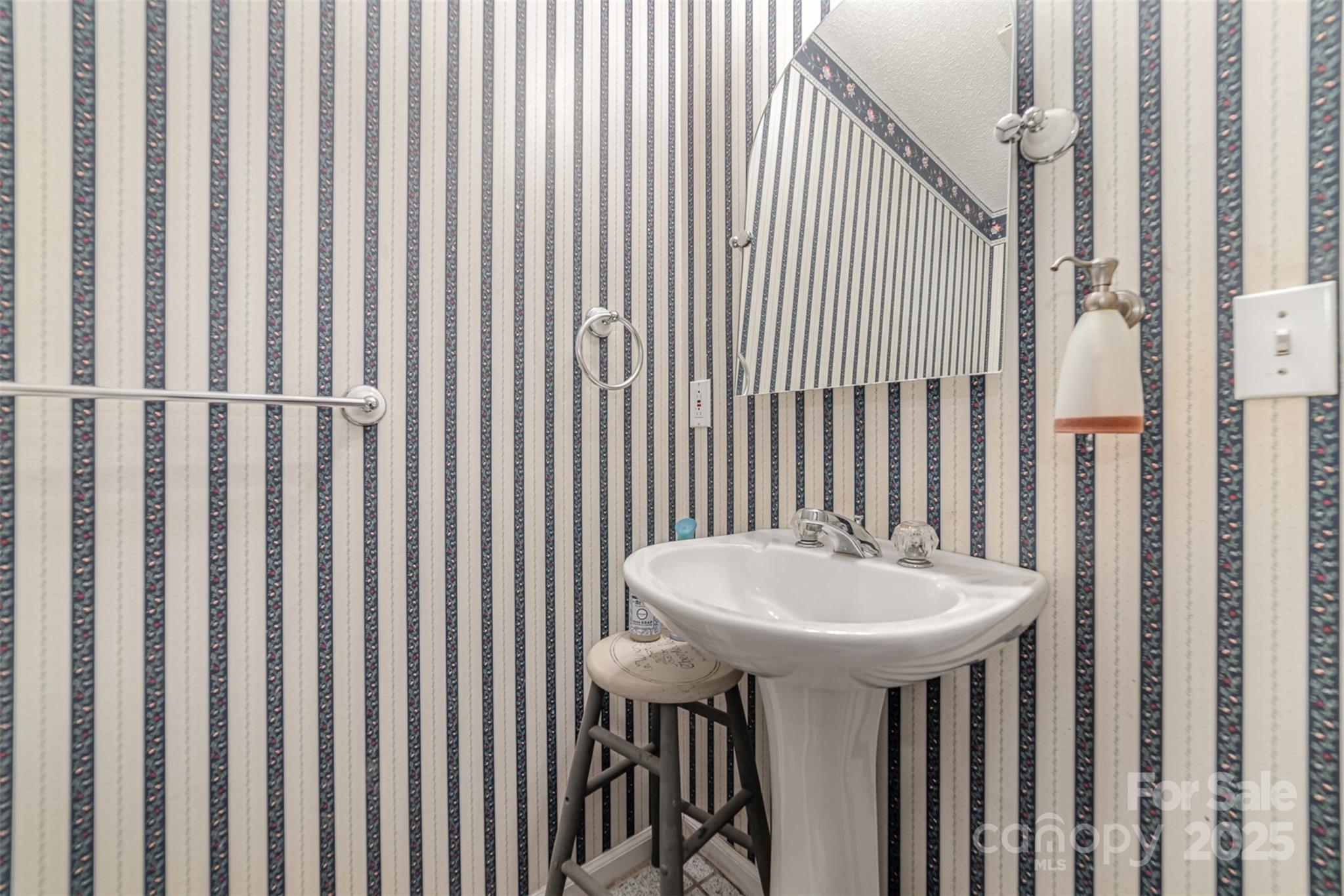 7430 Forney Hill Road Denver, NC 28037 - Photo 16 of 29 a bathroom with a sink toilet