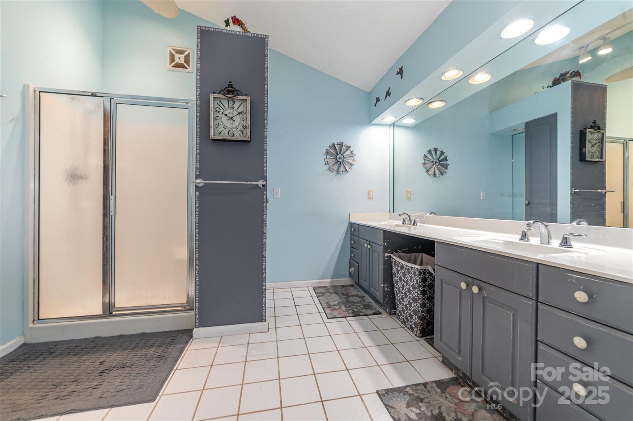 7430 Forney Hill Road Denver, NC 28037 - Photo 18 of 29 a bathroom with a sink a toilet and mirror