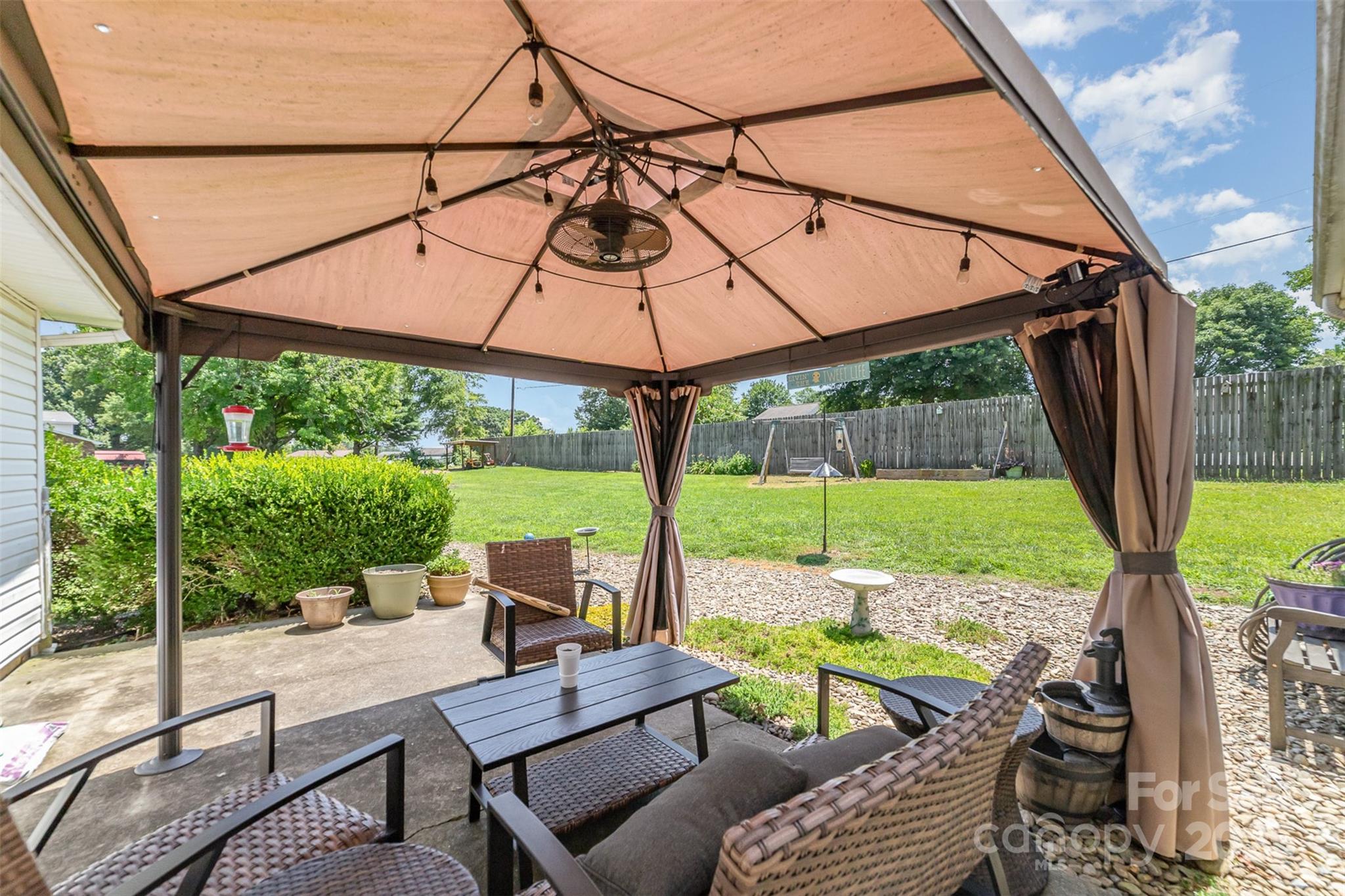 7430 Forney Hill Road Denver, NC 28037 - Photo 25 of 29 a view of an outdoor space with furniture and backyard