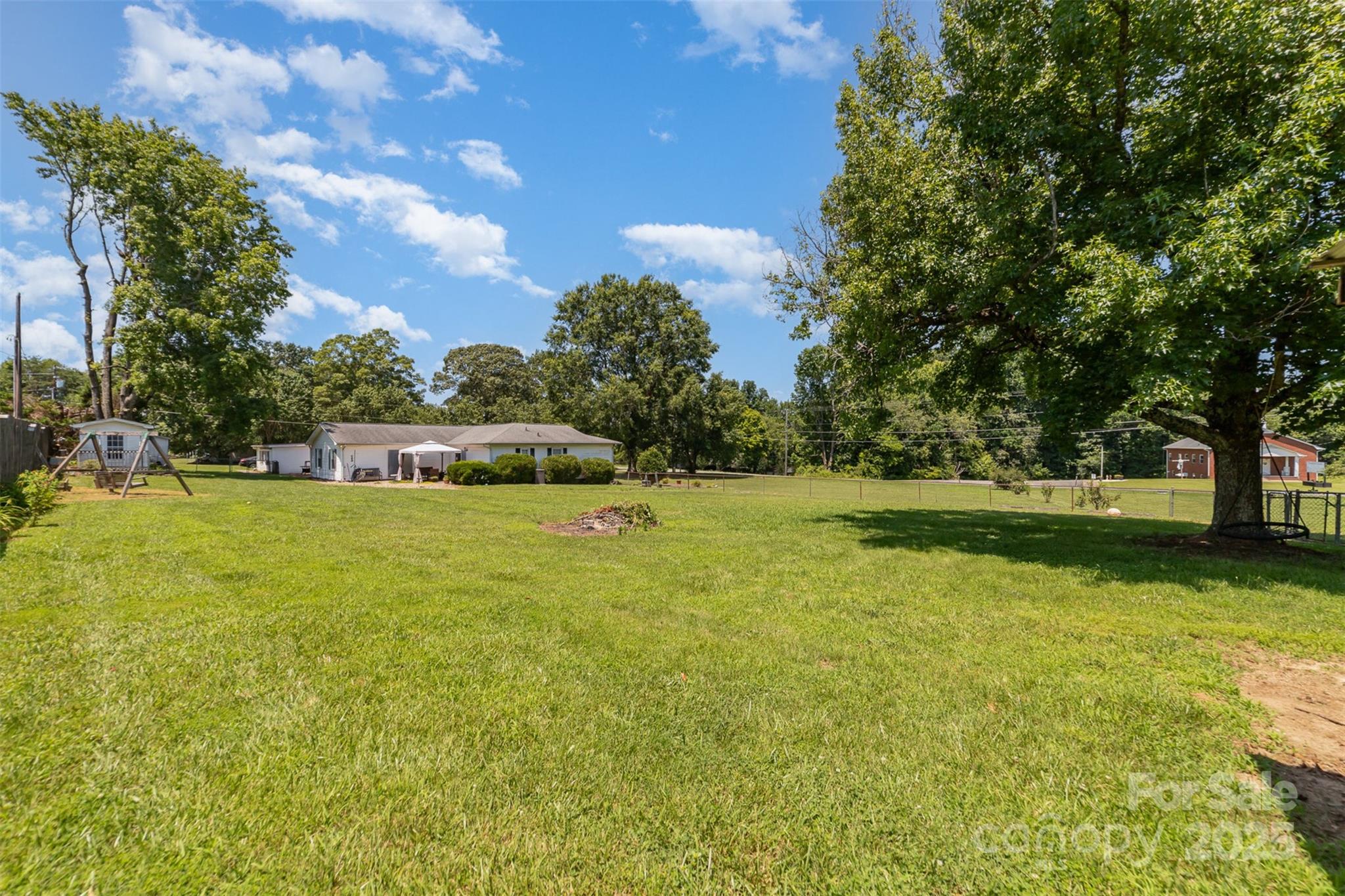 7430 Forney Hill Road Denver, NC 28037 - Photo 28 of 29 a view of outdoor space with garden and trees