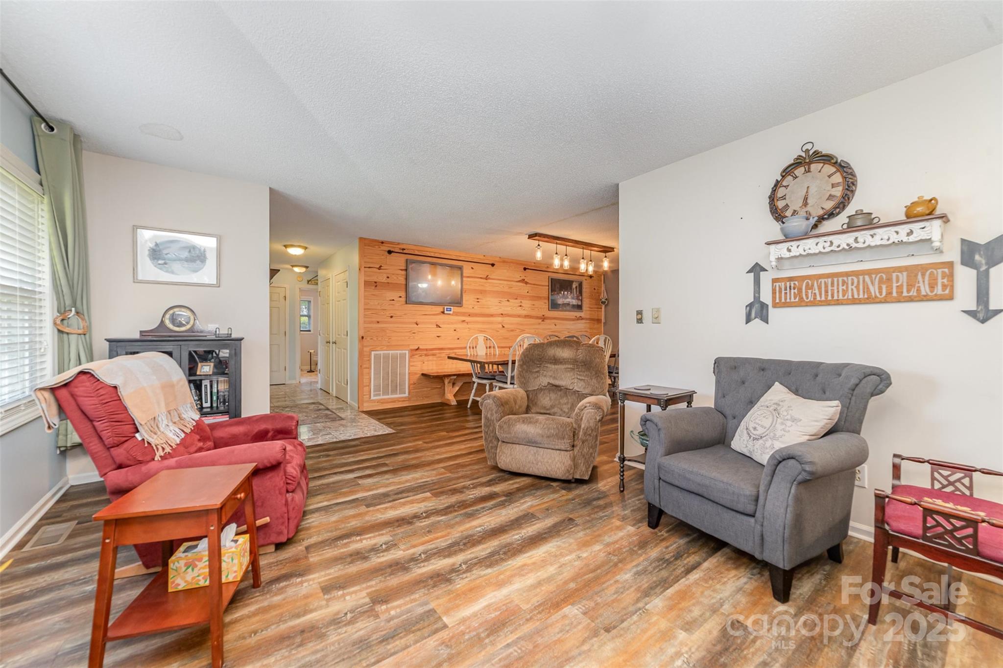 7430 Forney Hill Road Denver, NC 28037 - Photo 9 of 29 a living room with furniture and a large window