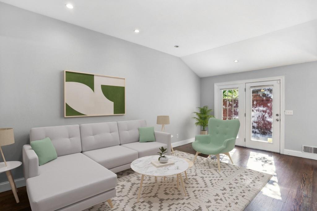 5375 Roswell Road Northeast, Unit C4 Atlanta, GA 30342 - Photo 1 of 1 a living room with furniture and a wooden floor