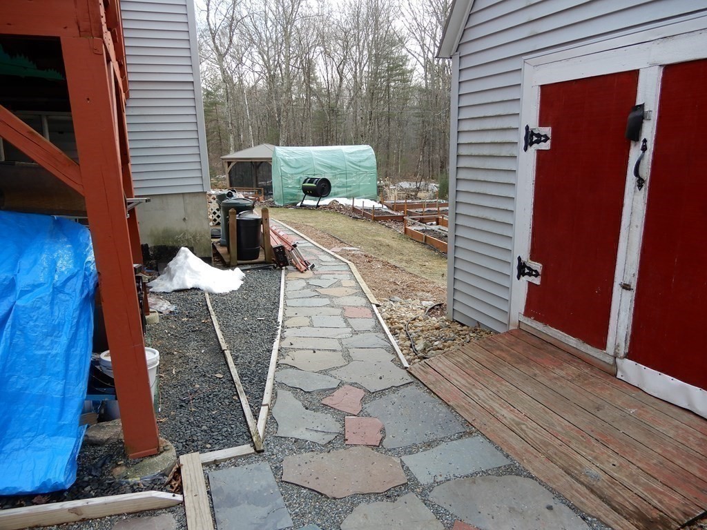 1013 Town Farm Road Warren, MA 01083 - Photo 11 of 38 a view of a backyard with sitting area