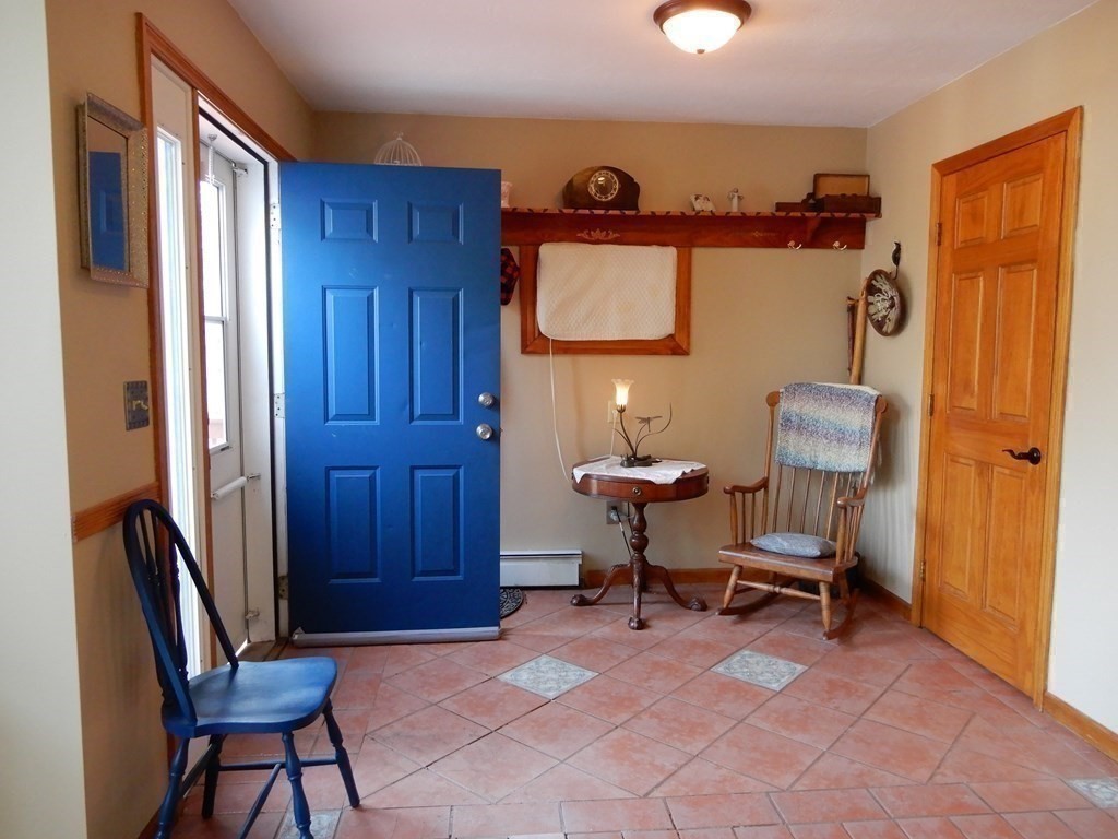 1013 Town Farm Road Warren, MA 01083 - Photo 16 of 38 a living room with furniture and a window