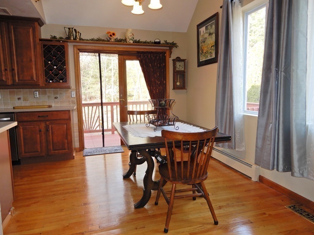 1013 Town Farm Road Warren, MA 01083 - Photo 24 of 38 a view of a dining room with furniture window and wooden floor