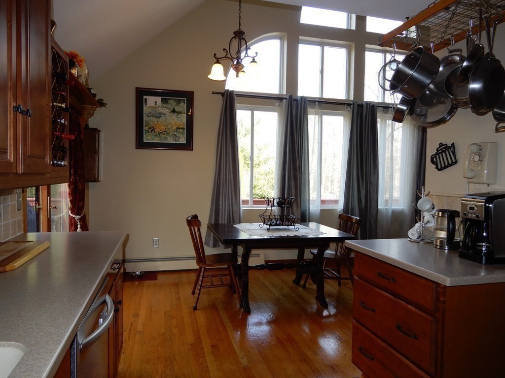 1013 Town Farm Road Warren, MA 01083 - Photo 27 of 38 a view of a dining room with furniture window and wooden floor