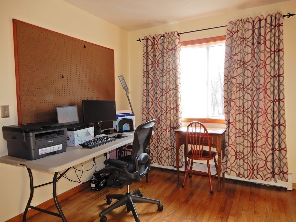 1013 Town Farm Road Warren, MA 01083 - Photo 35 of 38 a view of a workspace with furniture and a window