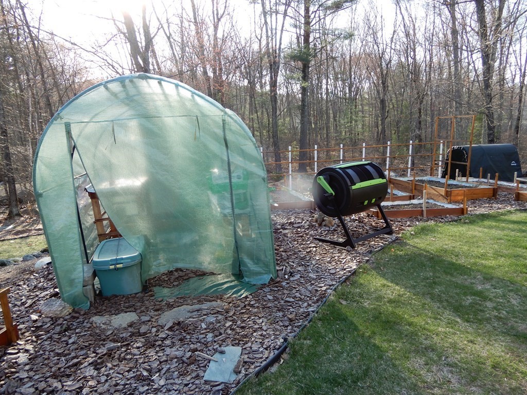 1013 Town Farm Road Warren, MA 01083 - Photo 8 of 38 a backyard of a house with outdoor seating