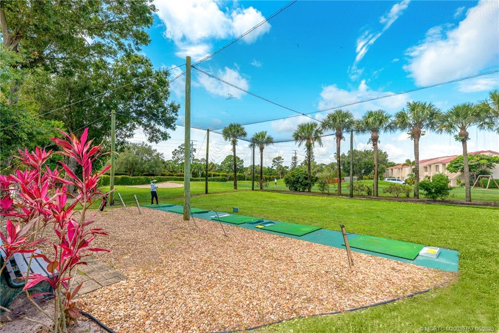 5413 Southeast Miles Grant Road, Unit G208 Stuart, FL 34997 - Photo 24 of 36 Driving range is ready for your warm up!