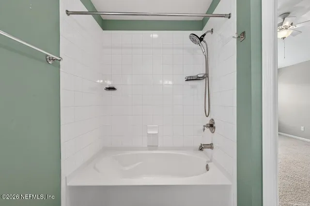 a bathroom with a bathtub