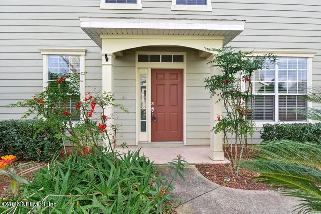 a front view of a house with a porch