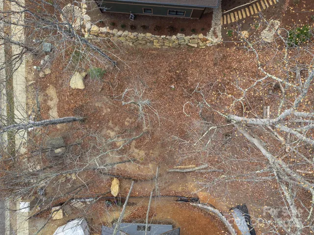 a view of a bathroom with a sink and mirror