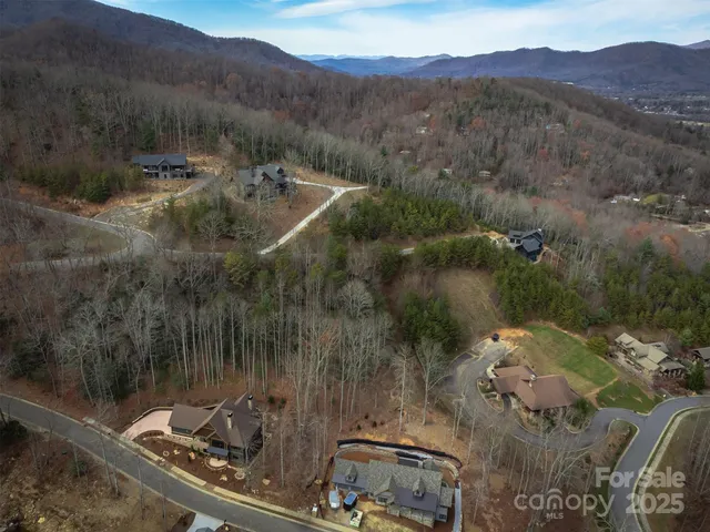 a view of a house with a mountain
