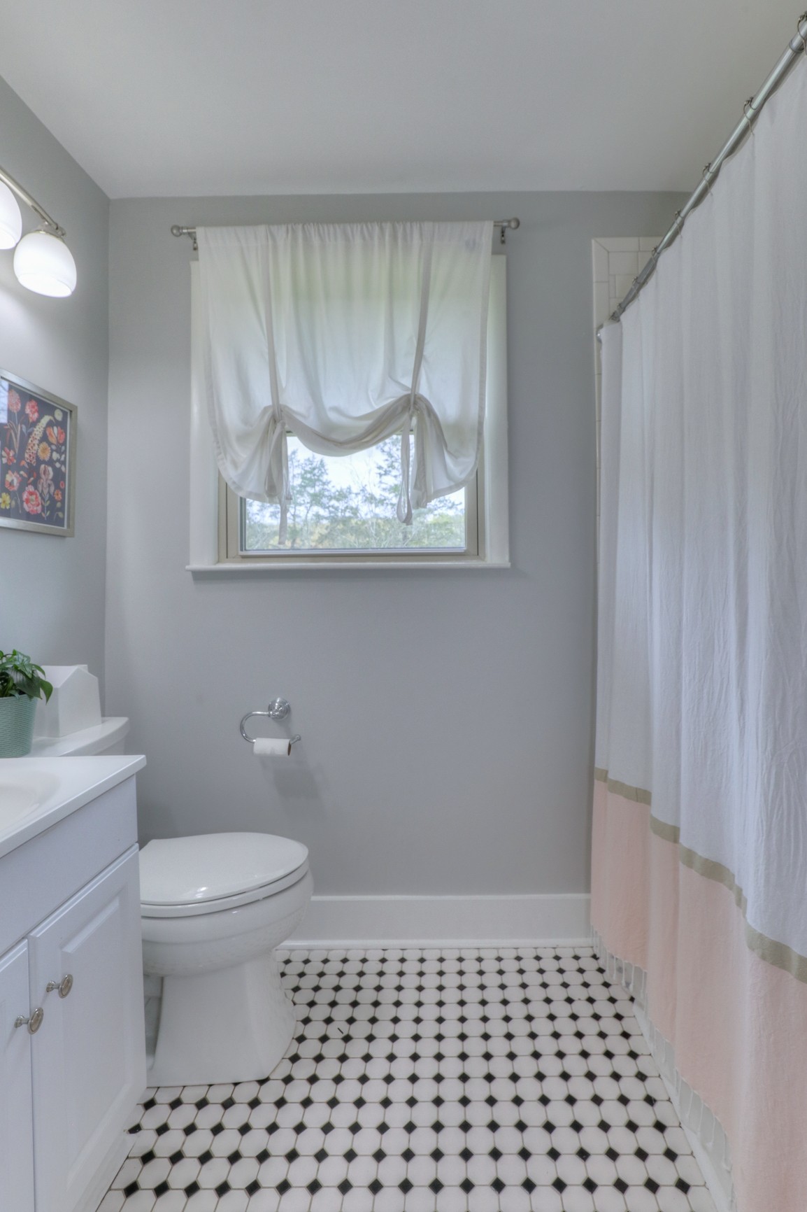 1217 Davidson Road Nashville, TN 37205 - Photo 20 of 43 a bathroom with a toilet a window and a shower