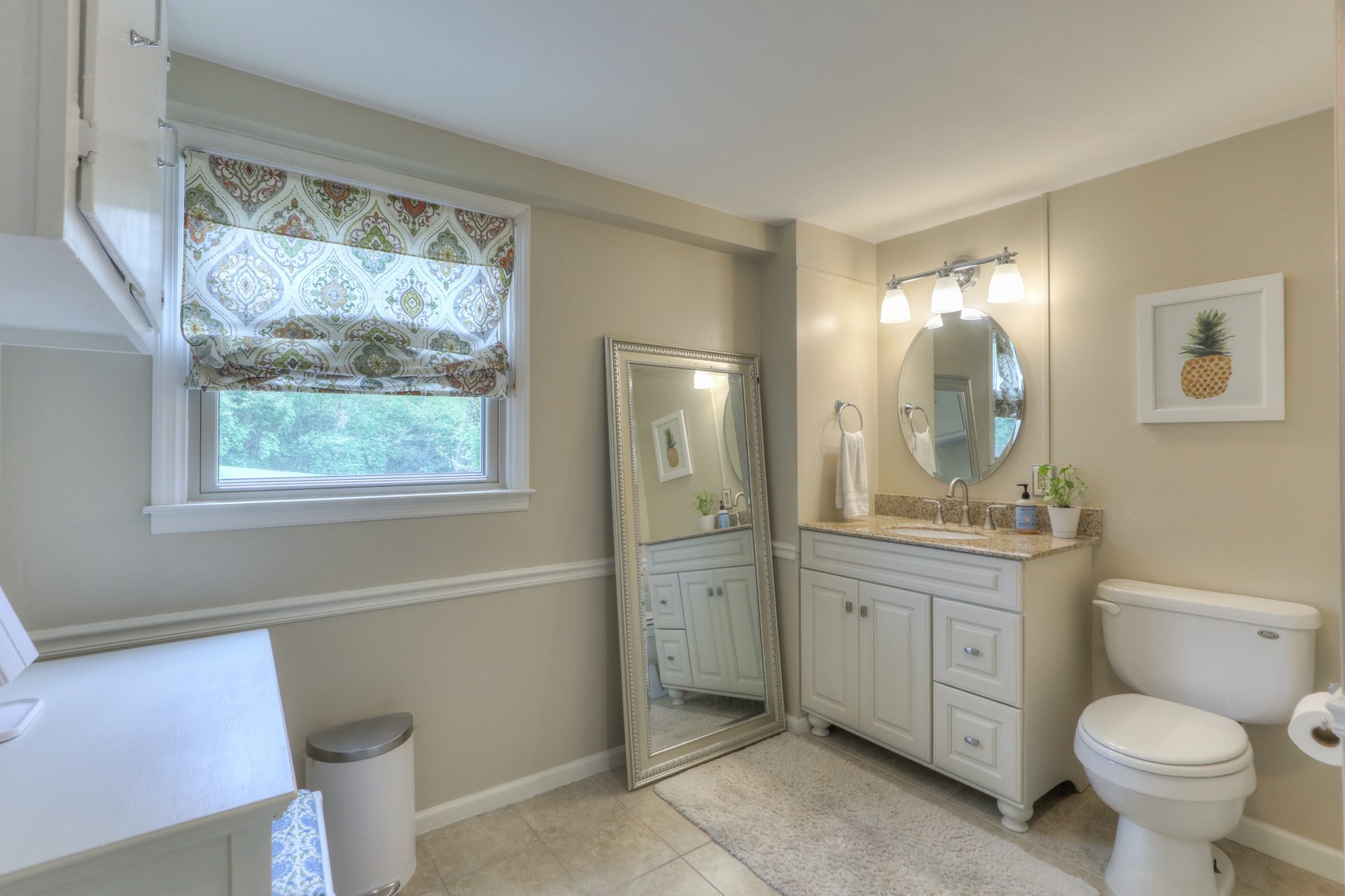 1217 Davidson Road Nashville, TN 37205 - Photo 30 of 43 a bathroom with a toilet sink and mirror