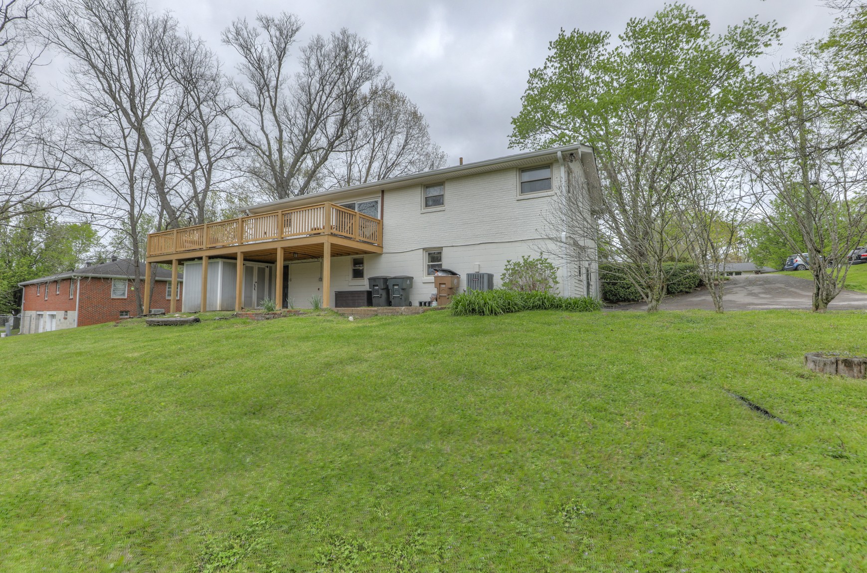 1217 Davidson Road Nashville, TN 37205 - Photo 37 of 43 a view of a house with a backyard
