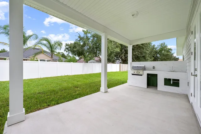a view of swimming pool with outdoor seating