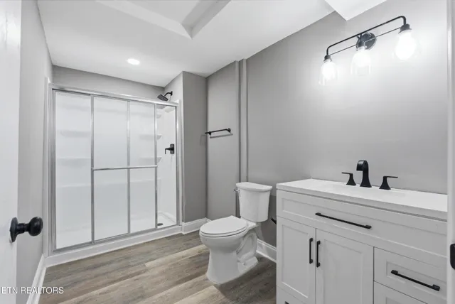 a swimming pool with outdoor seating and yard