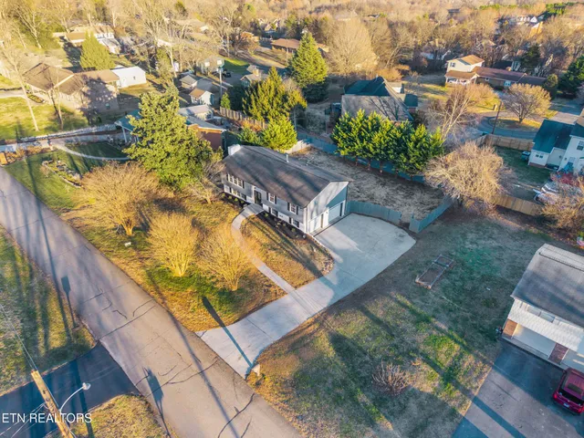 a house view with a backyard space