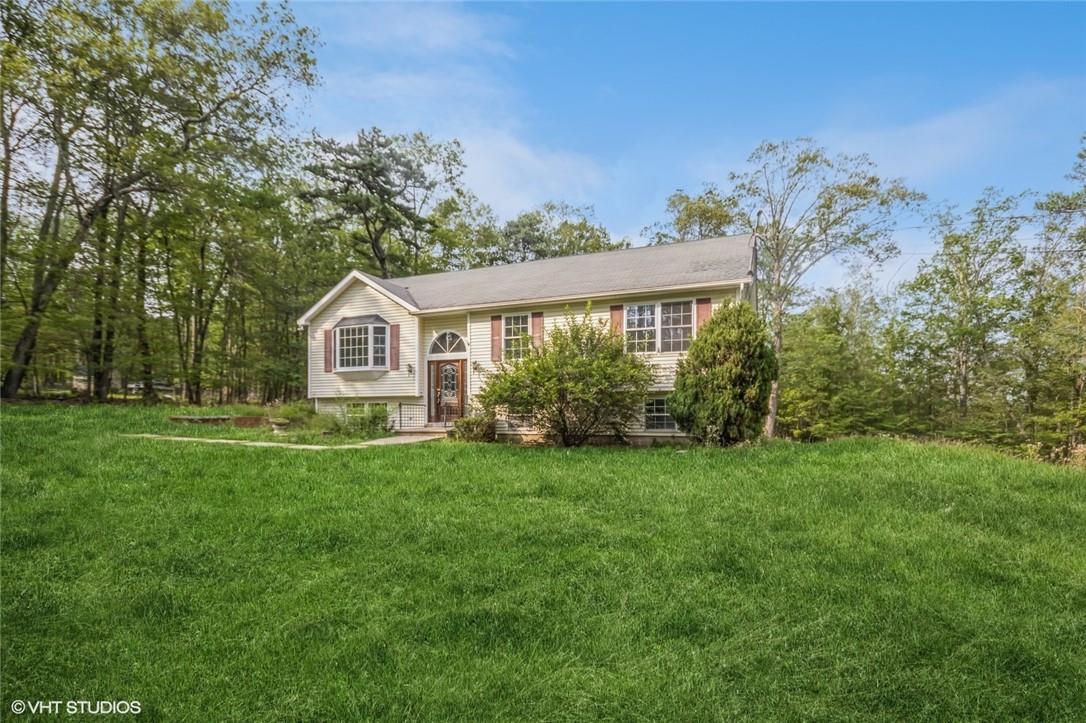 464 Ski Run Road Bloomingburg, NY 12721 - Photo 1 of 1 Split foyer home with a front lawn
