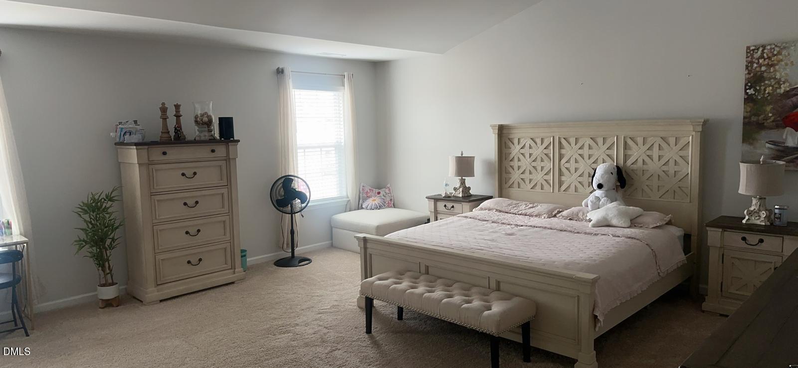 7643 Jordan Road Rocky Mount, NC 27803 - Photo 11 of 23 a bedroom with a bed and a dresser