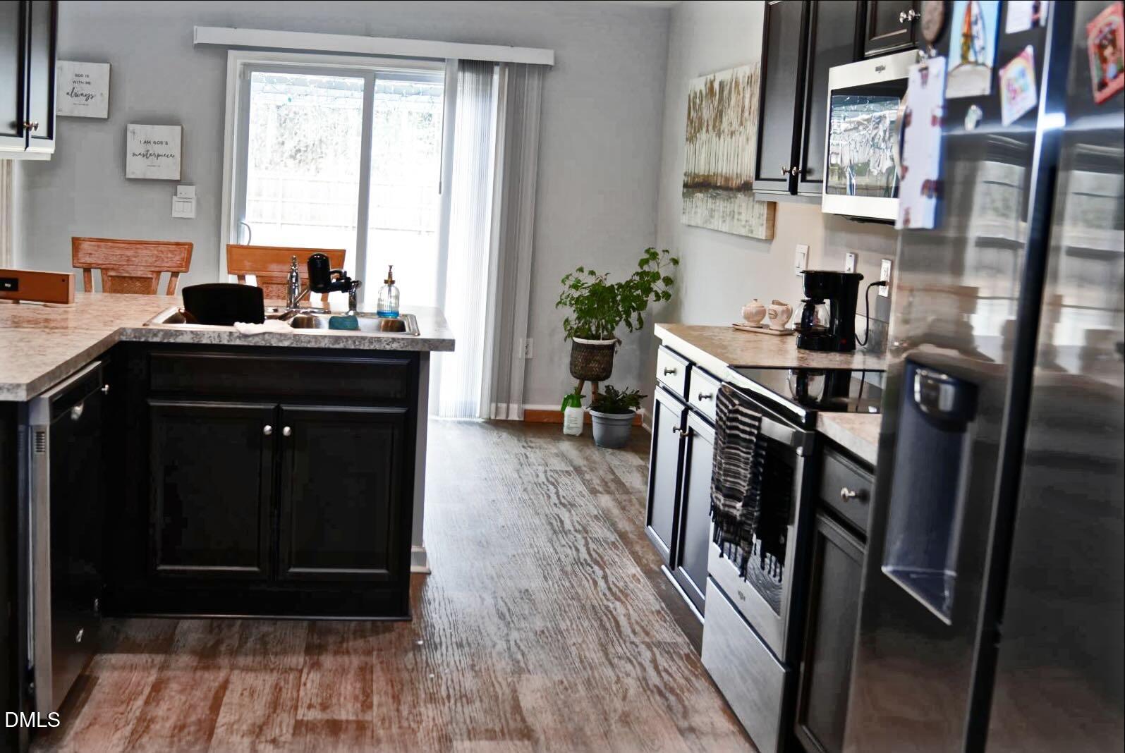 7643 Jordan Road Rocky Mount, NC 27803 - Photo 2 of 23 a kitchen with a sink appliances and a window