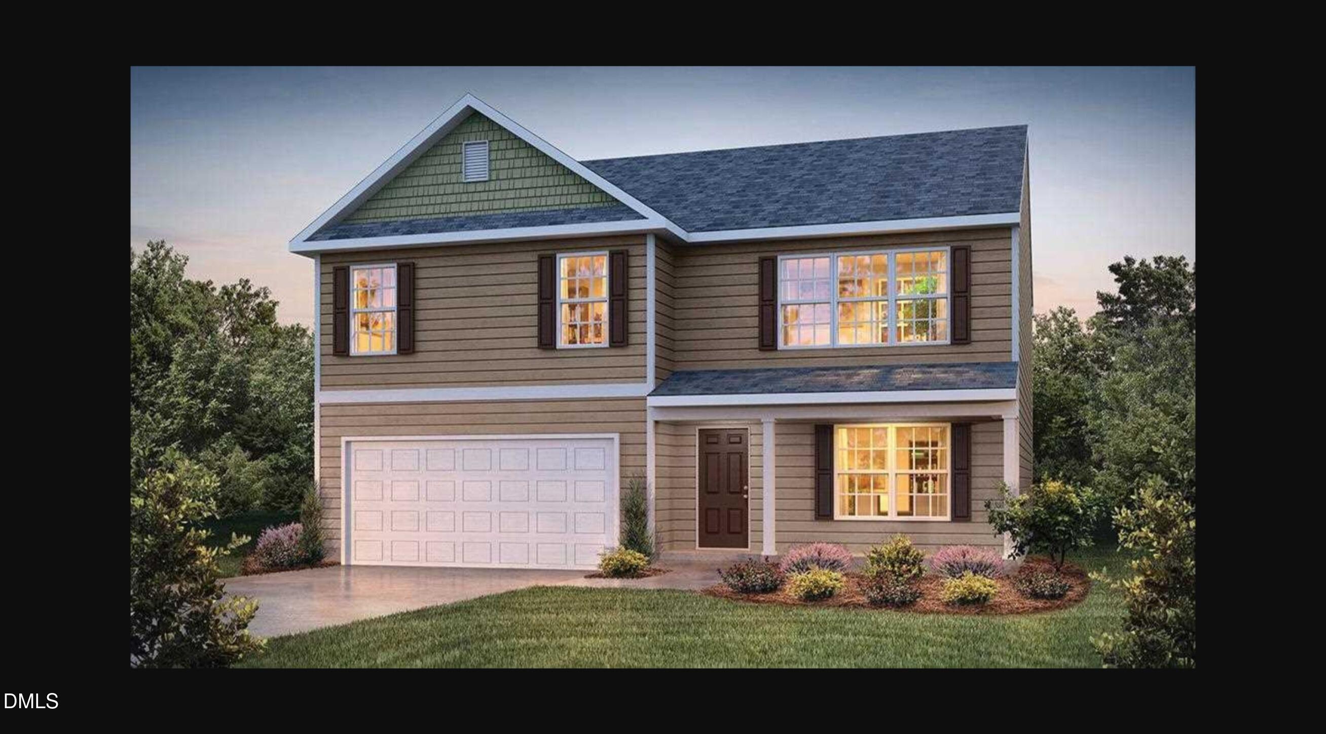 7643 Jordan Road Rocky Mount, NC 27803 - Photo 23 of 23 a front view of a house with garden