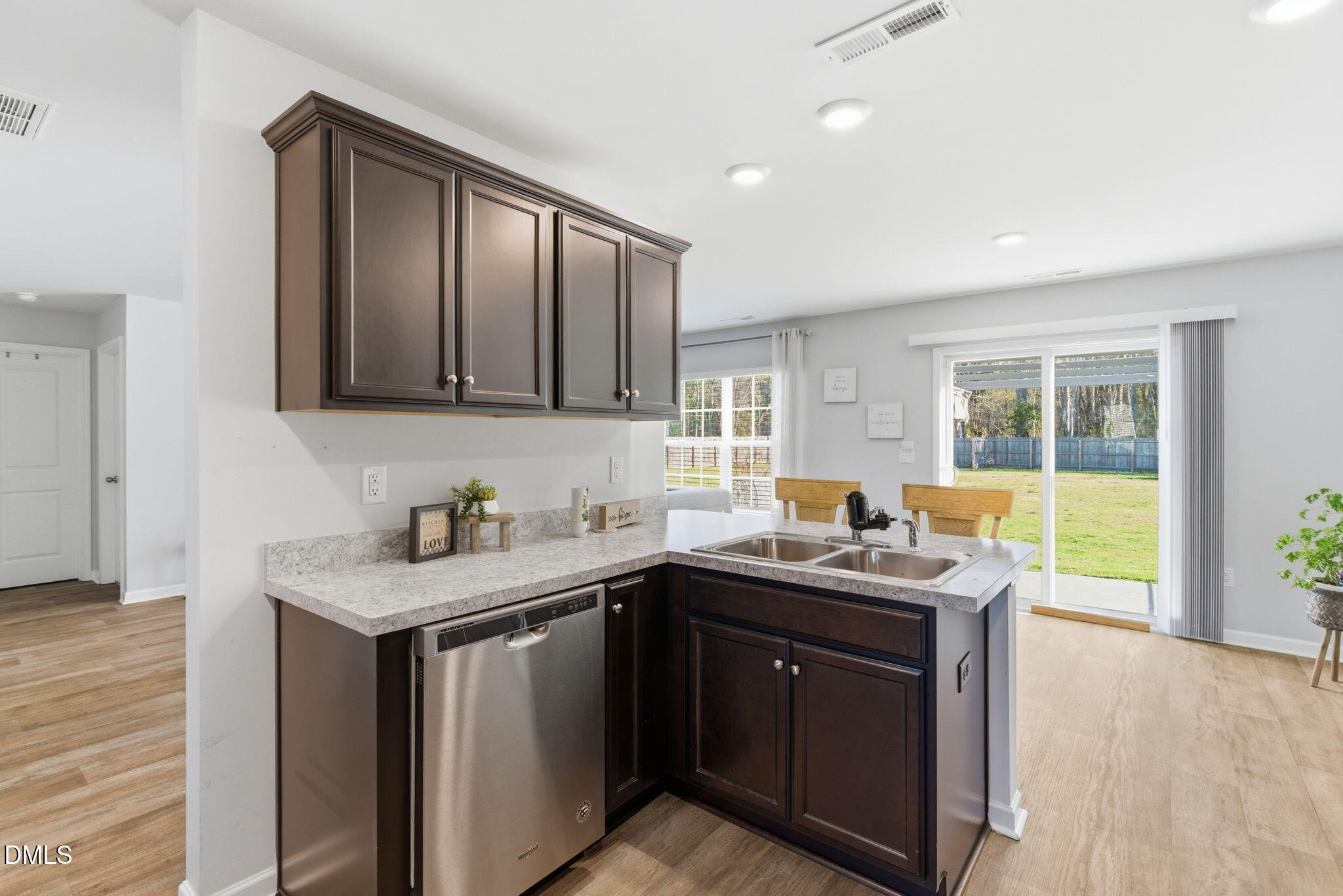 7643 Jordan Road Rocky Mount, NC 27803 - Photo 5 of 17 a kitchen with a sink a stove and cabinets