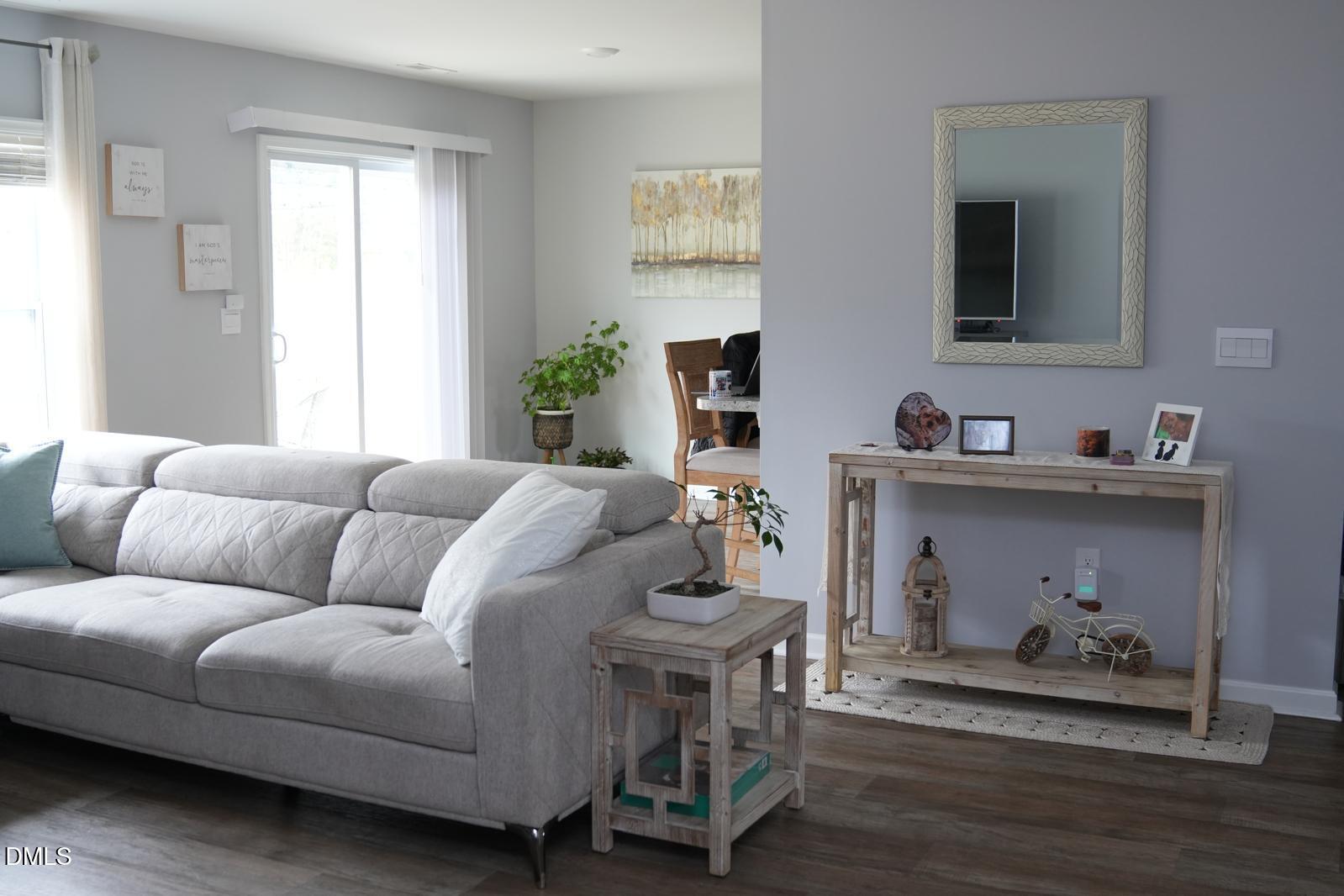 7643 Jordan Road Rocky Mount, NC 27803 - Photo 5 of 23 a living room with furniture and a wooden floor