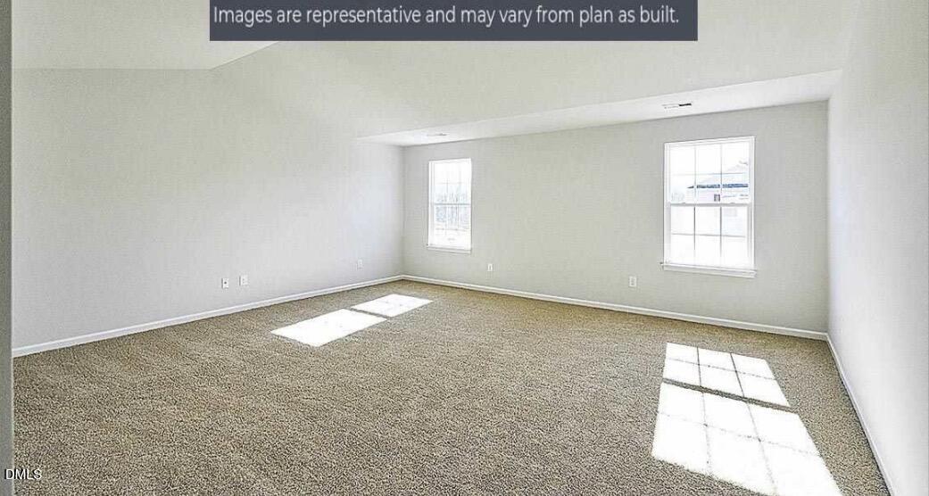 7643 Jordan Road Rocky Mount, NC 27803 - Photo 10 of 23 an empty room with a window