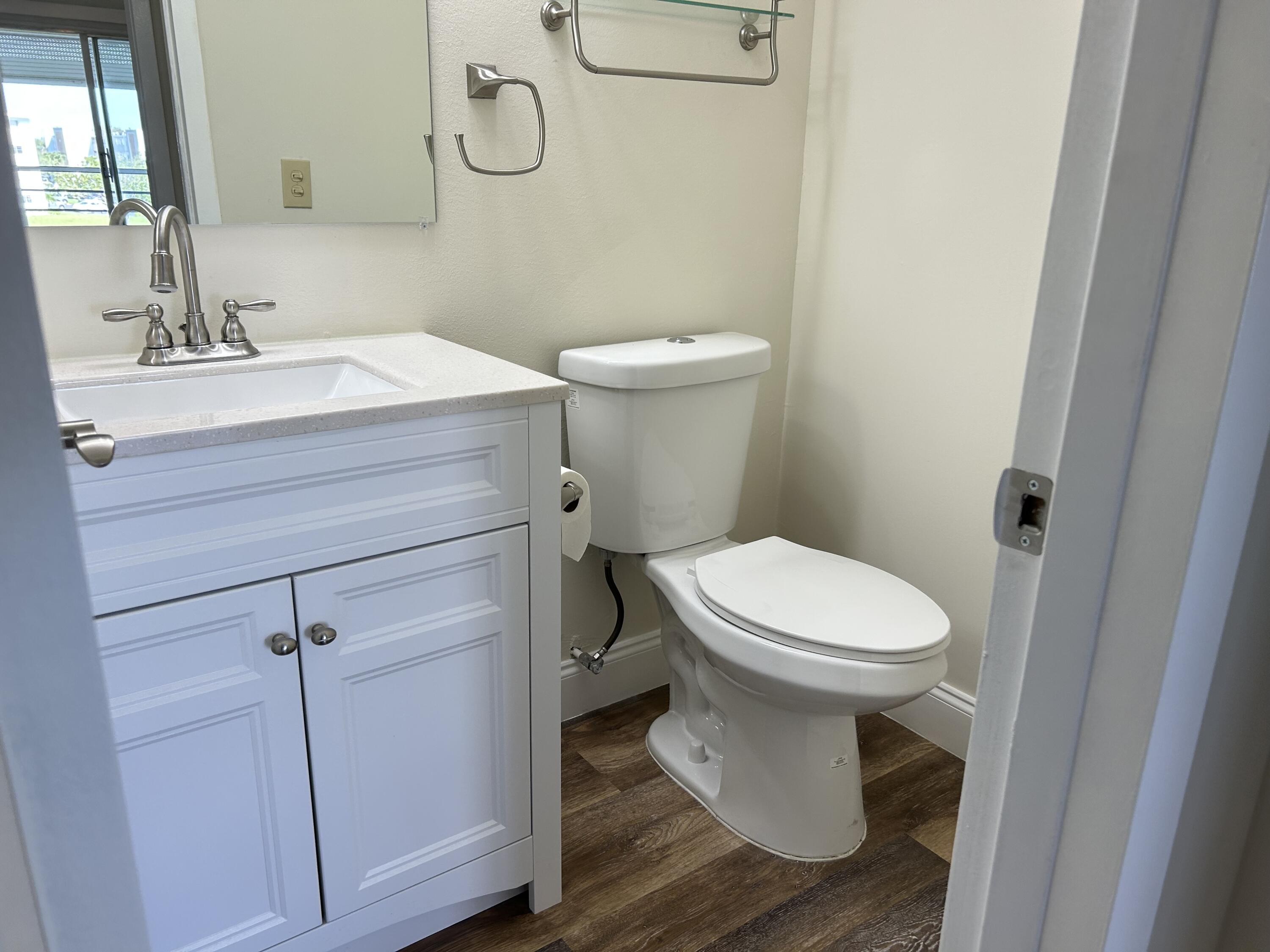 3046 Exeter C Boca Raton, FL 33434 - Photo 11 of 18 Half Bathroom
